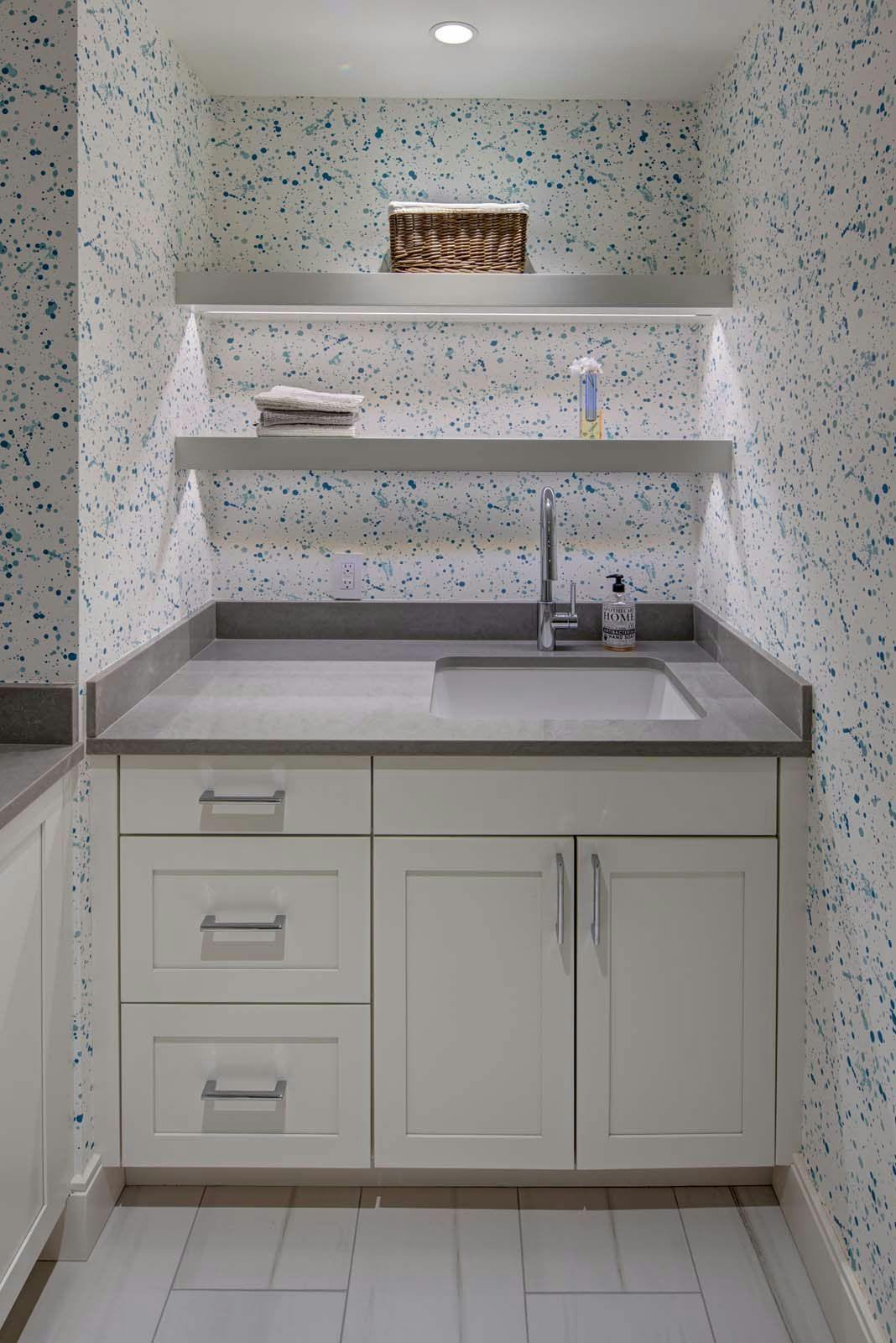mini sink and cabinets with shelving