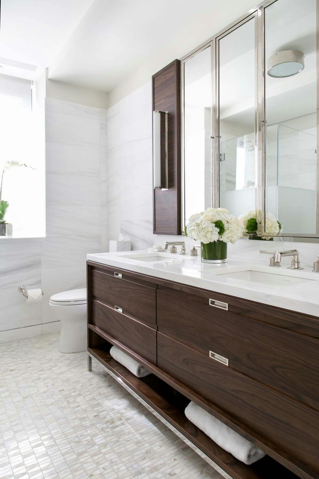 50th st bathroom with dark wood vanity