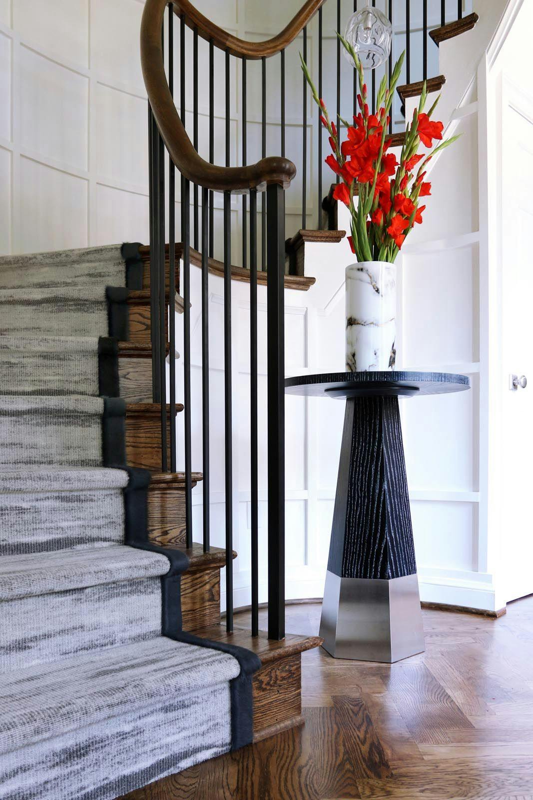crossover entryway with spiral staircase