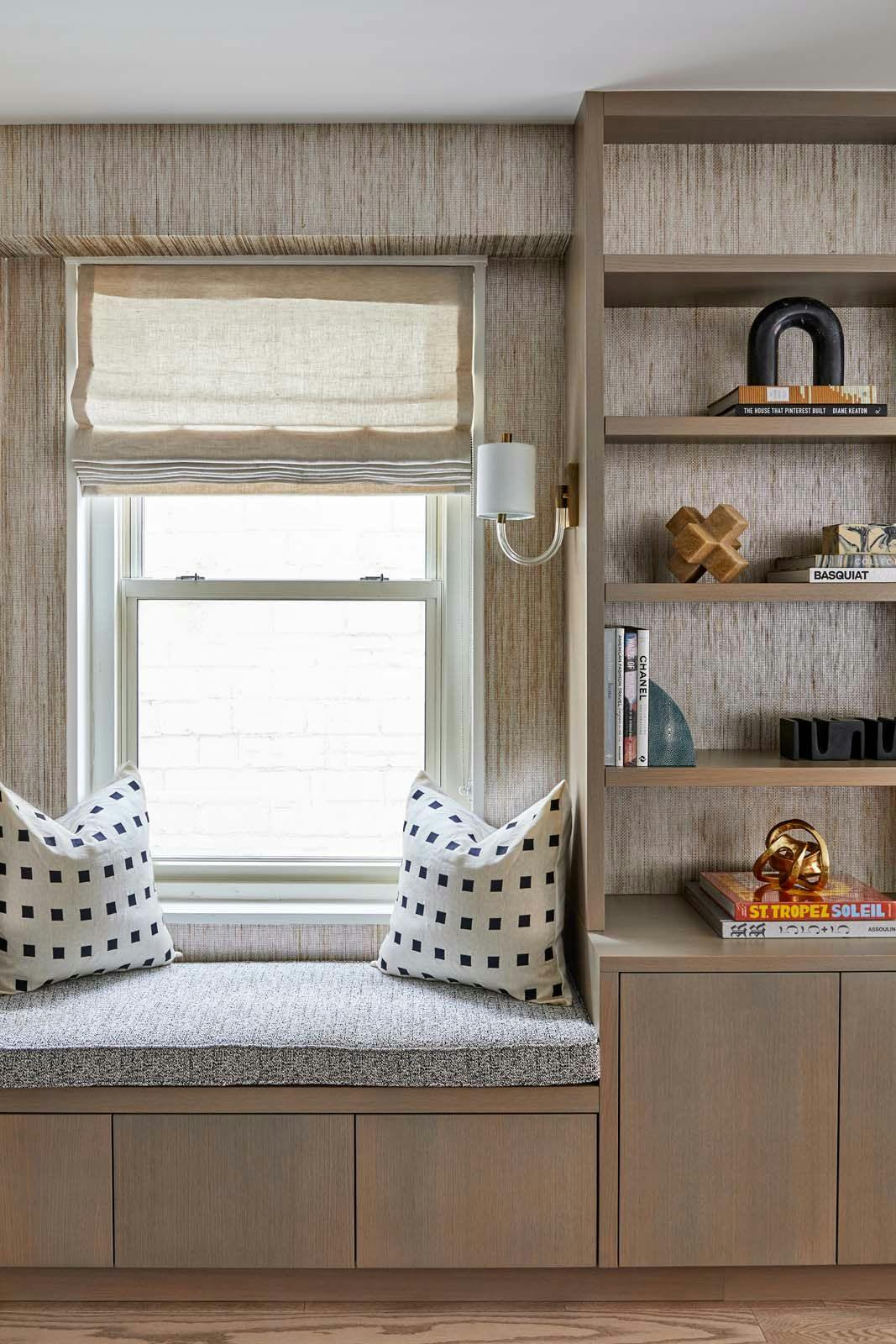 sitting nook with a window and pillows